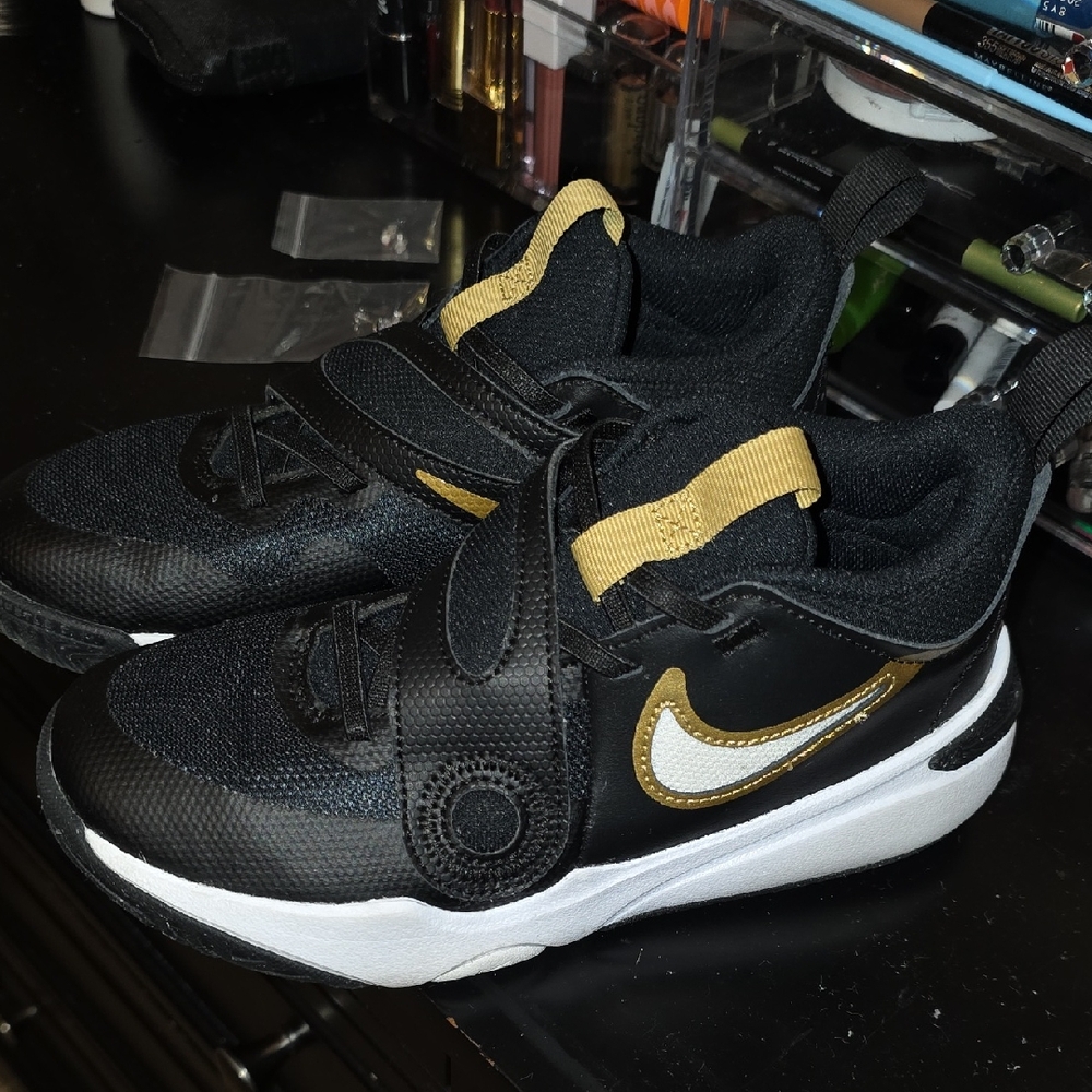 Nike Kids Black and Gold Athletic Shoes